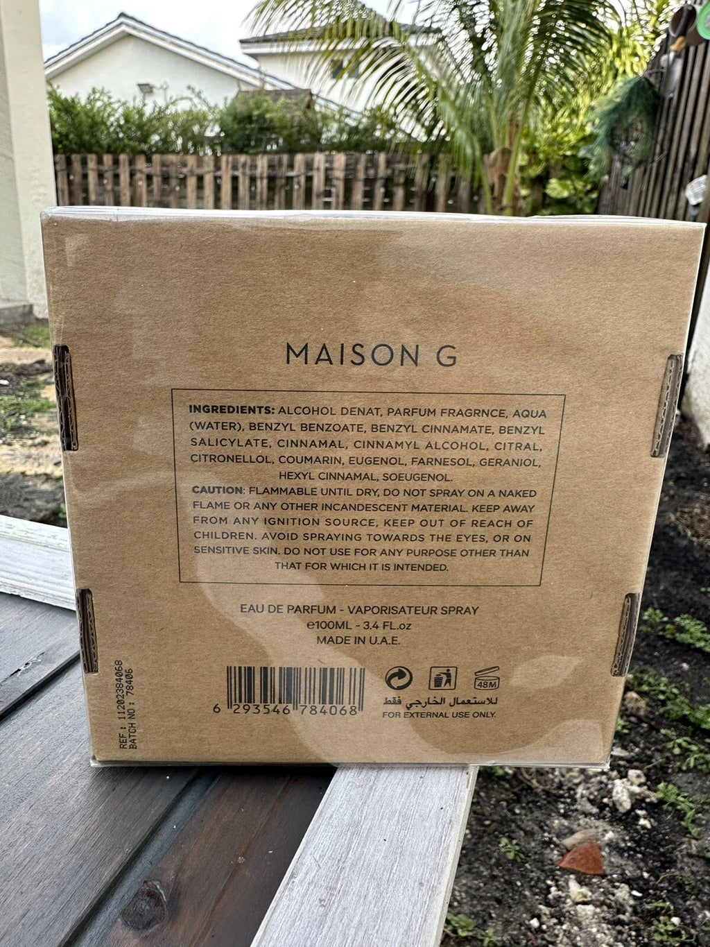Back of a cardboard packaging with 'MAISON G' branding and product details.