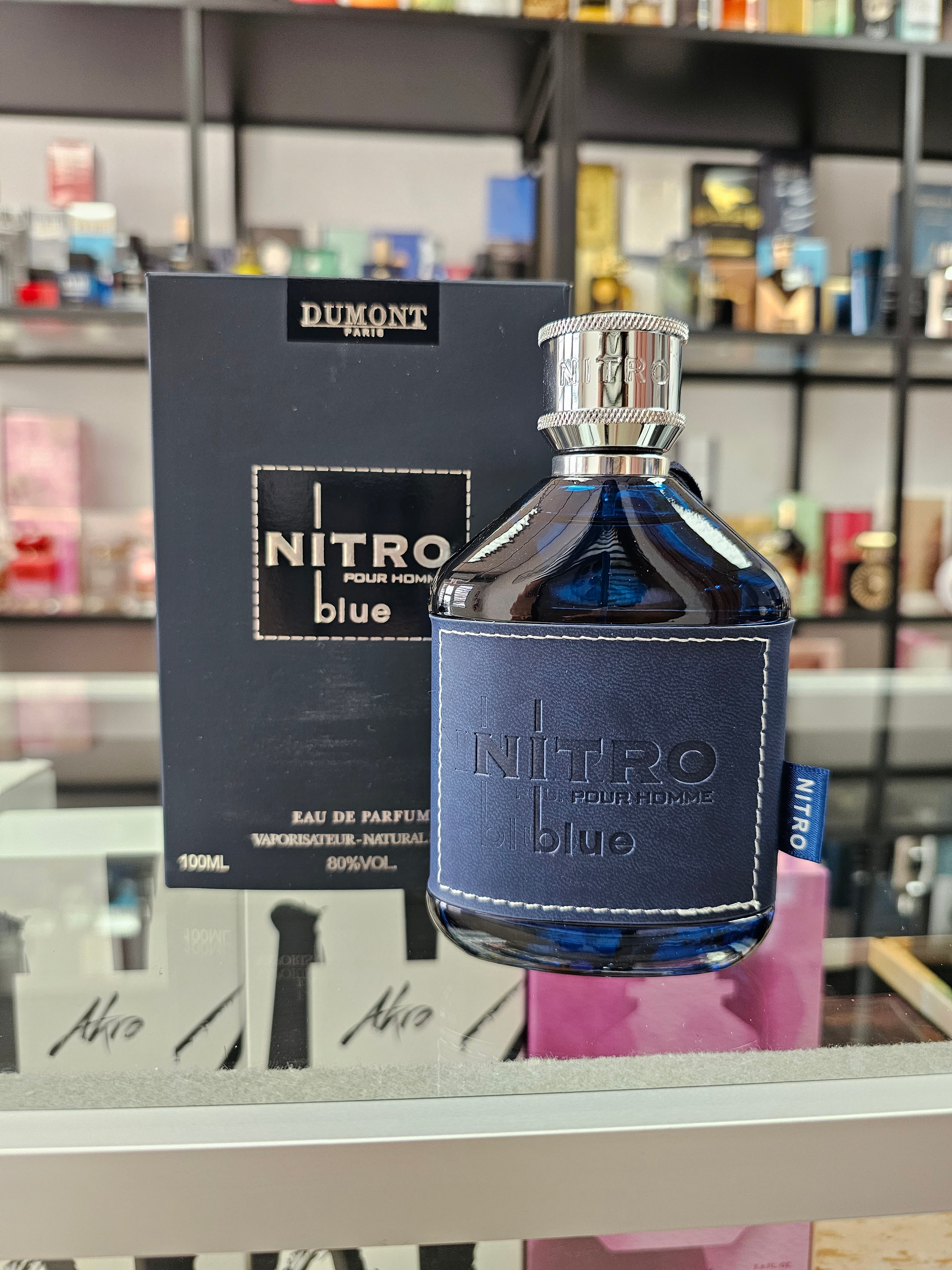 Blue Nitro perfume bottle with packaging on a shelf