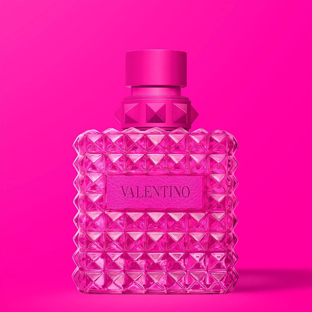 Pink Valentina perfume bottle on a pink background
