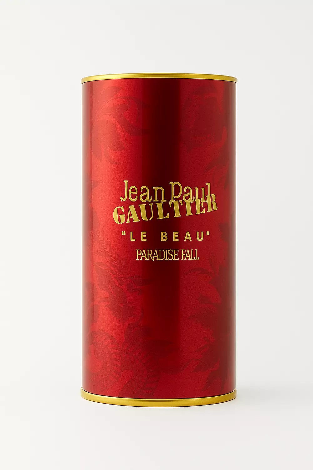 Red cylindrical container with gold text featuring 'Jean Paul Gaultier Le Beau Paradise Fall' on a white background