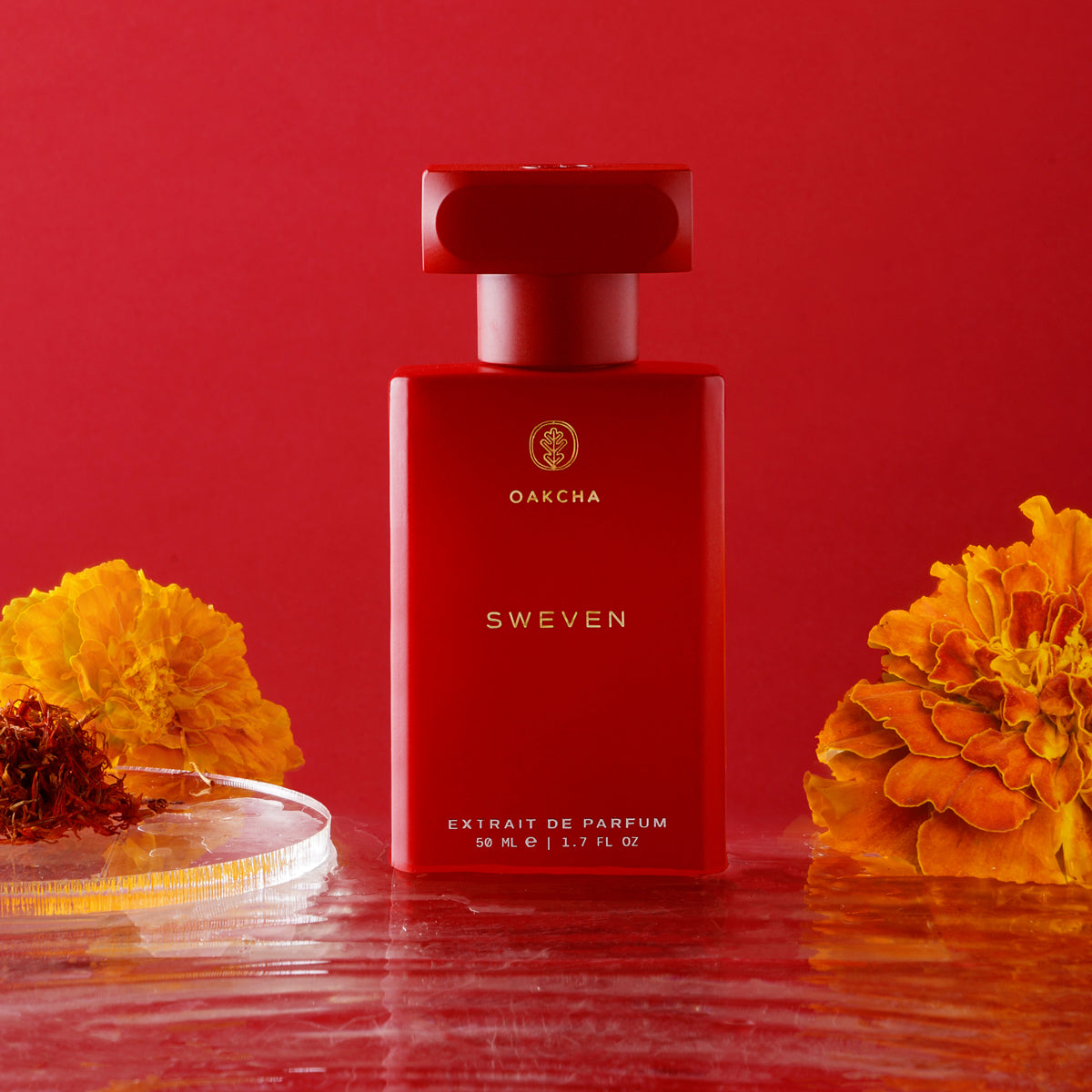 Red perfume bottle labeled 'Sweven' with marigold flowers on a red background