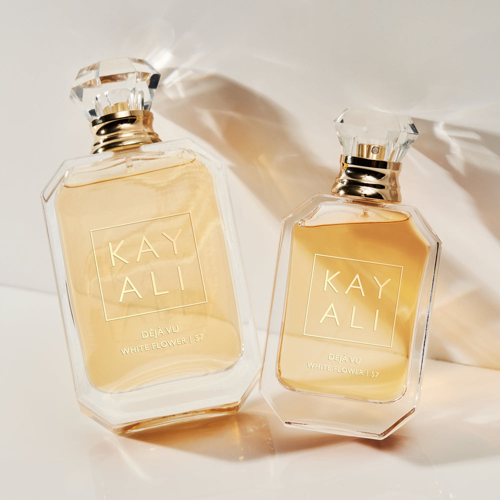 Two bottles of Kayali perfume on a light background