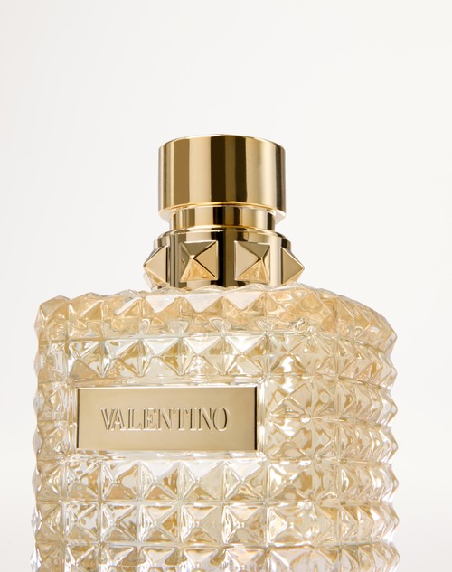 Valentino perfValentino perfume bottle with gold cap on a white backgroundume bottle with gold cap on a white background