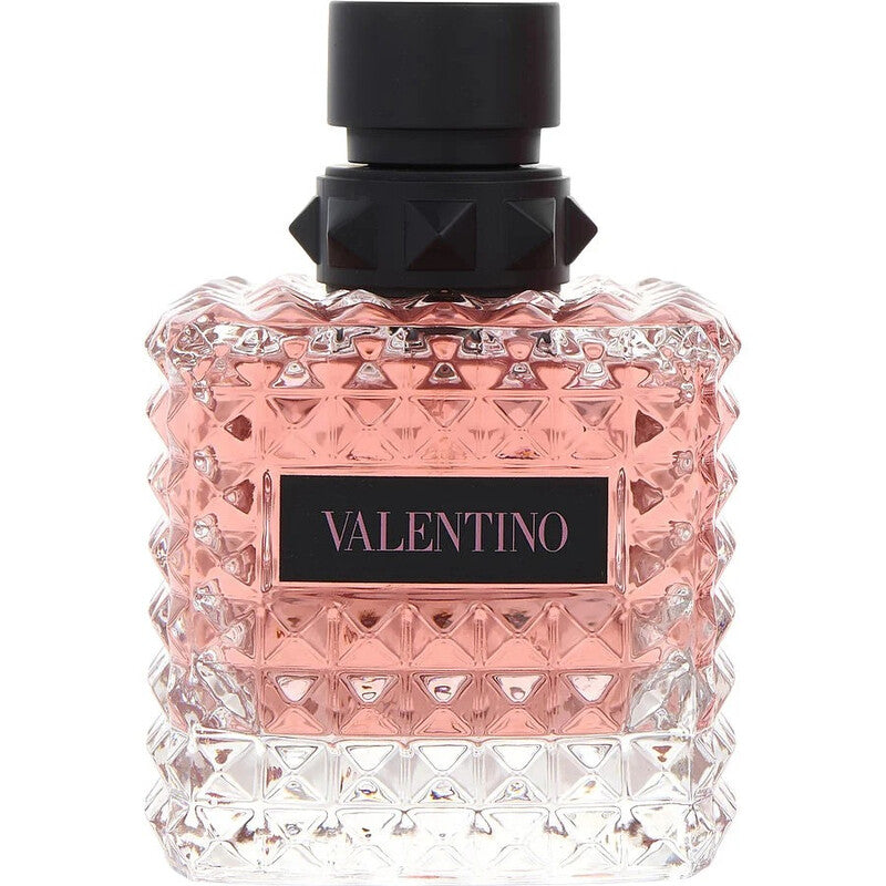 Valentino perfume bottle with pink diamond-patterned design on a white background